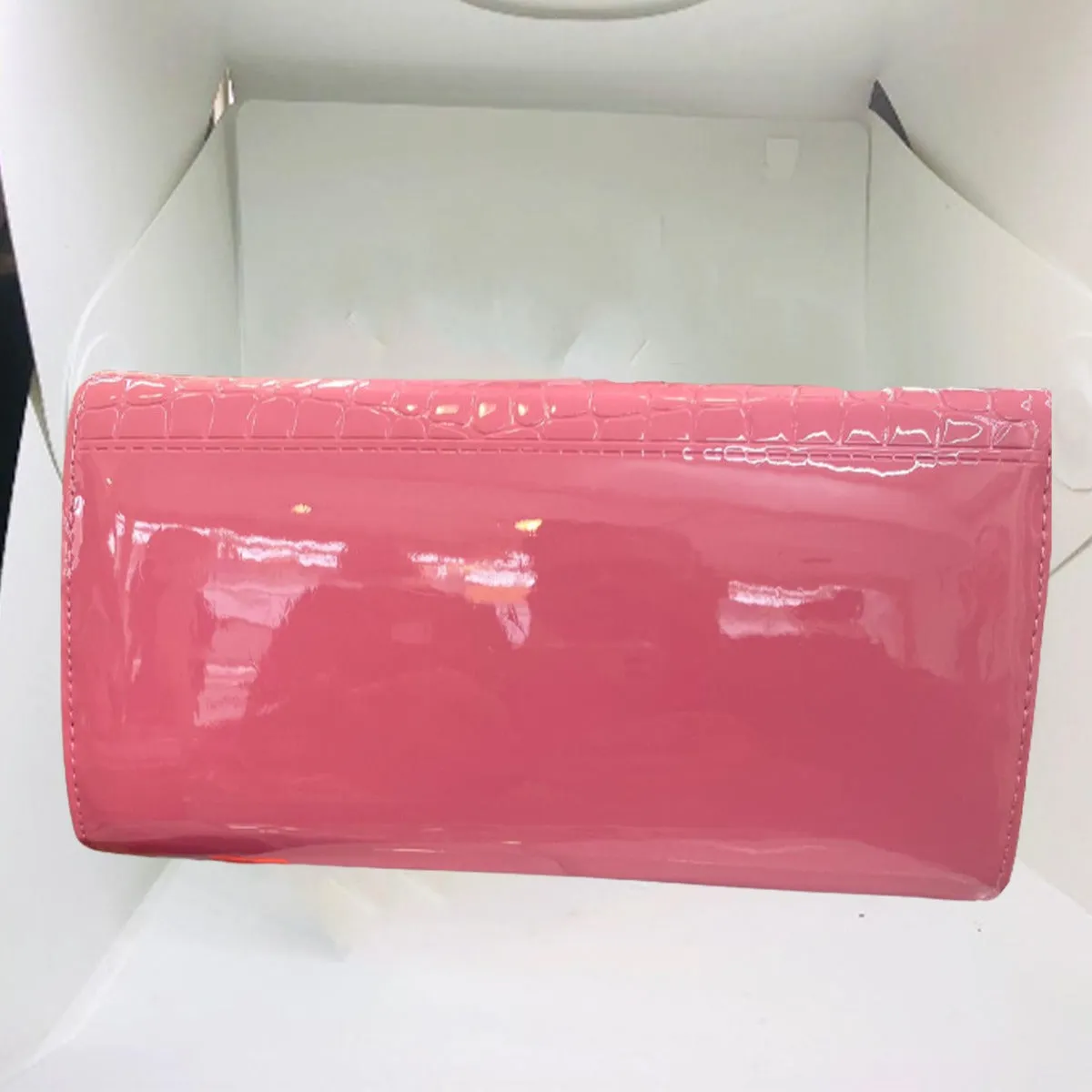 Baby Pink Gold bar clutch from STYLEHEIST